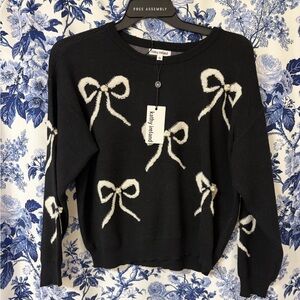 Kathy Ireland Black Sweater with Cream Bow Accents